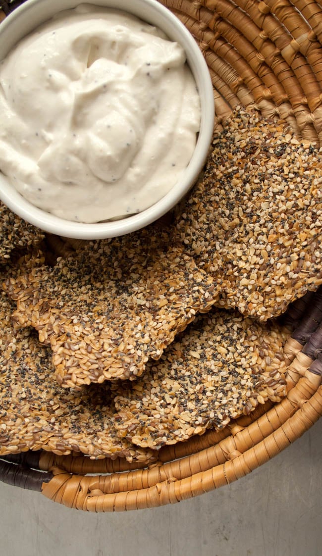 Everything Bagel Flax Crackers in basket with dip.