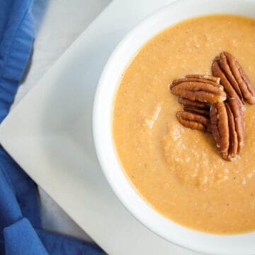 Sweet Potato Soup with Pecans in a bowl.