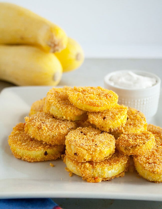 Fried Squash with a Crispy Cornmeal Batter on a plate.