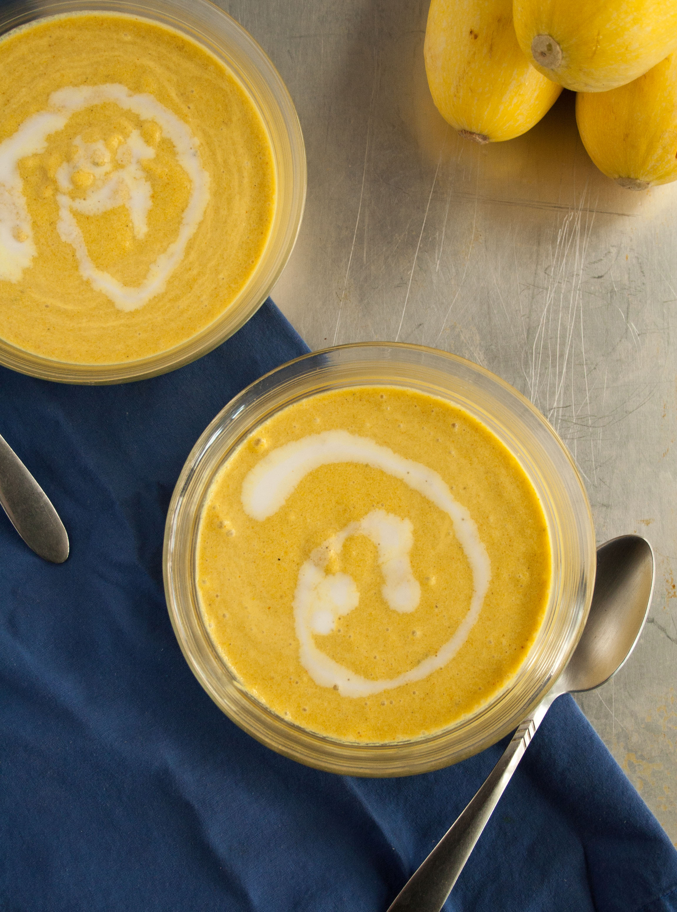 Curried Summer Squash Soup in bowls birds eye view.