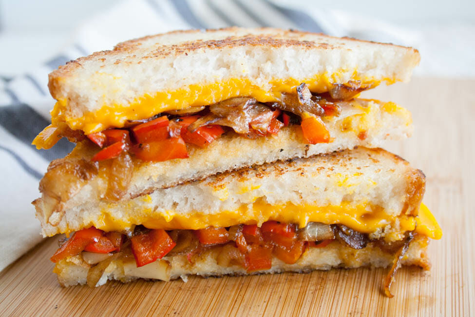 Vegan Grilled Cheese with Caramelized Onions and Red Pepper close up.