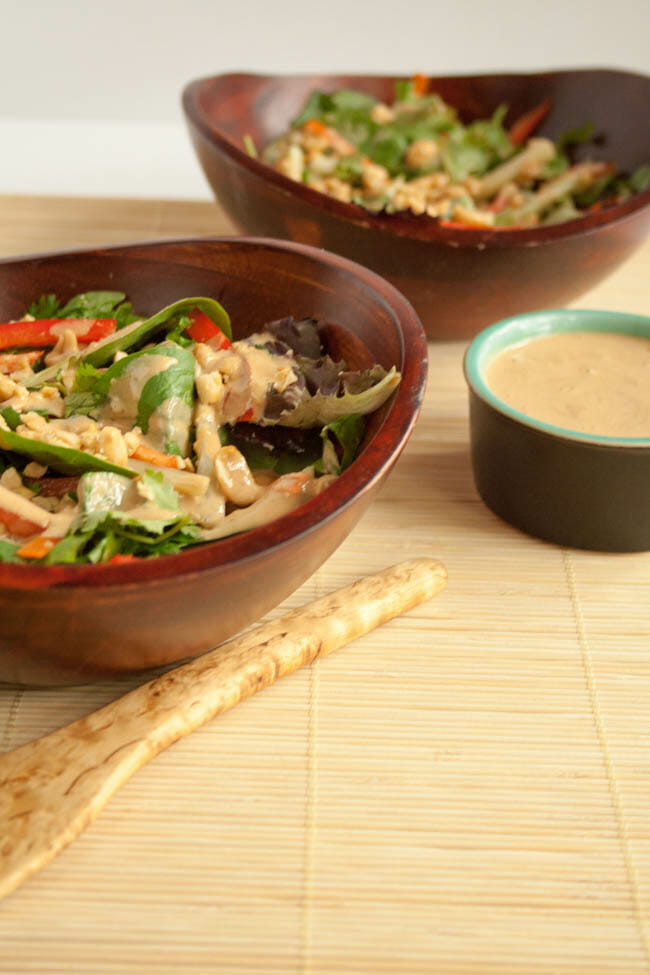 Thai Salad with Peanut Dressing in wooden bowls