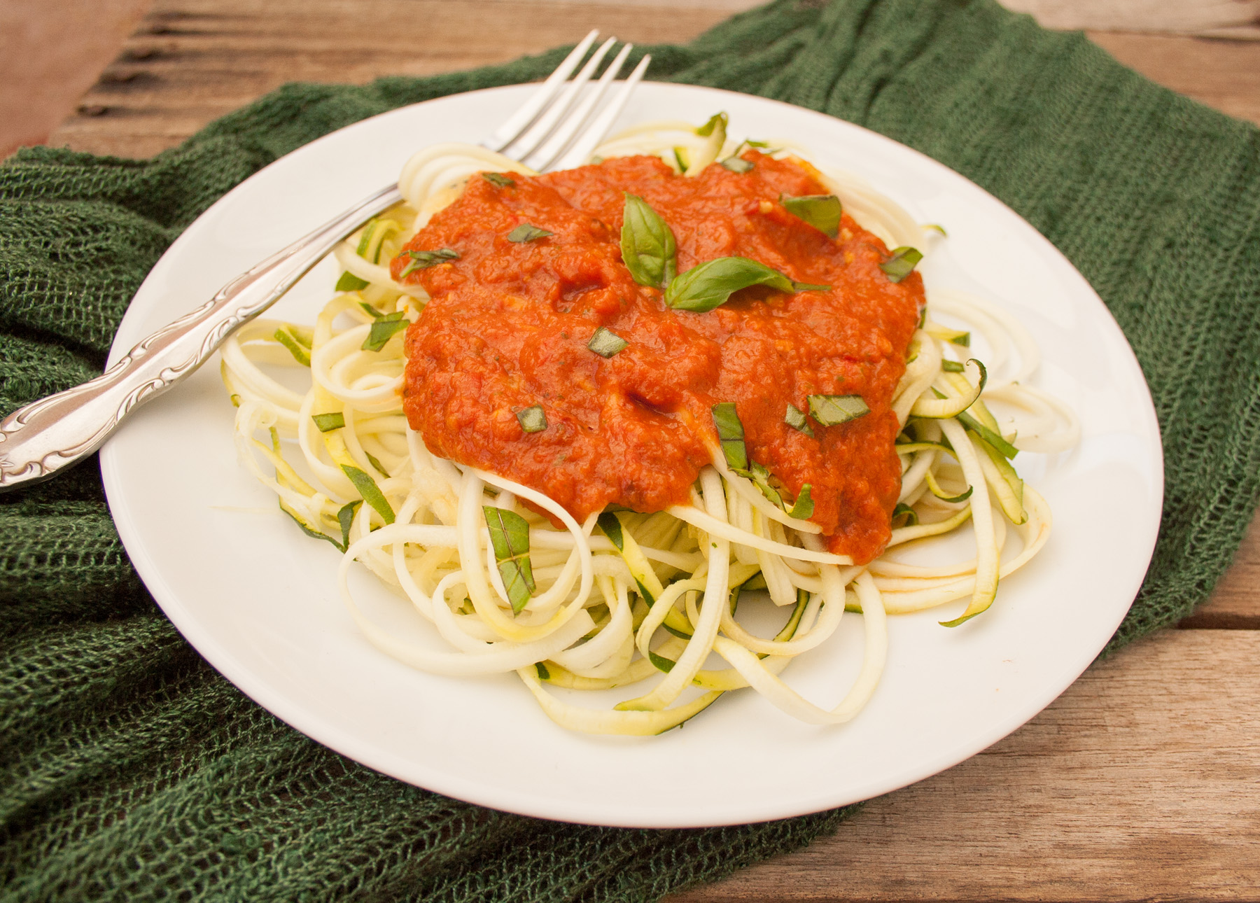 Zucchini Noodles with Raw Red Pepper Sauce close up.