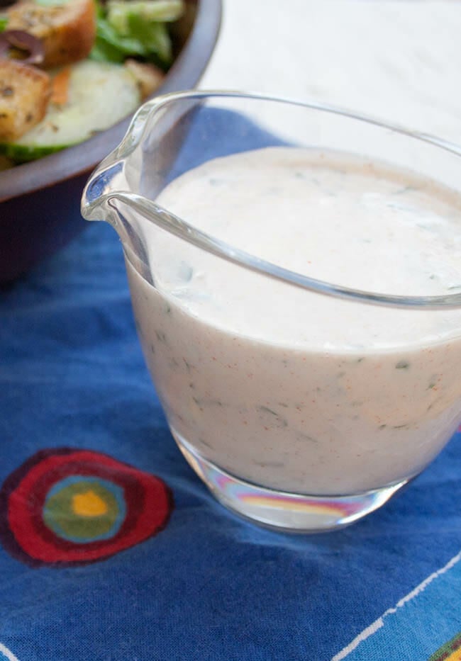 Vegan Ranch Dressing in small pitcher close up.