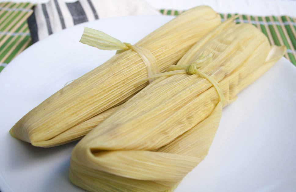 Corn Tamales on a plate.