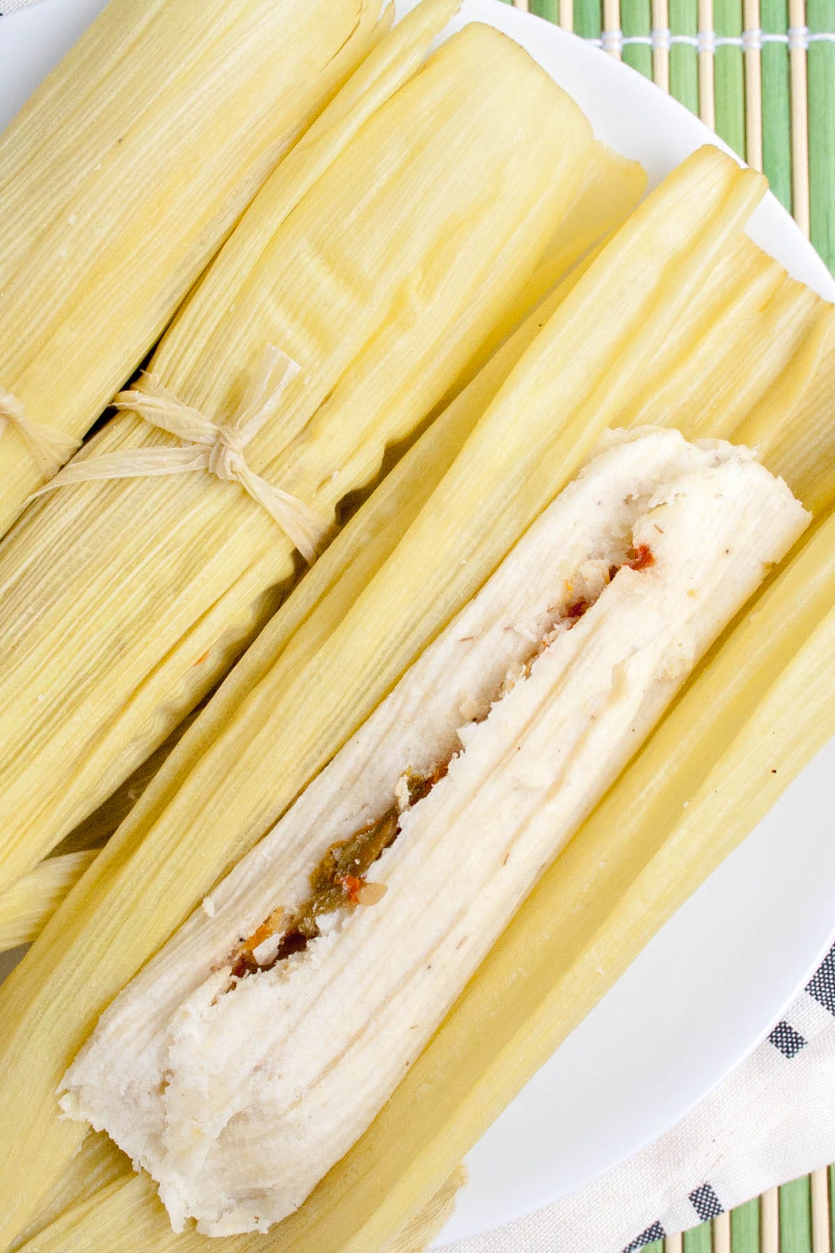 Vegan Green Corn Tamales (Tamales de Elote) on a plate.