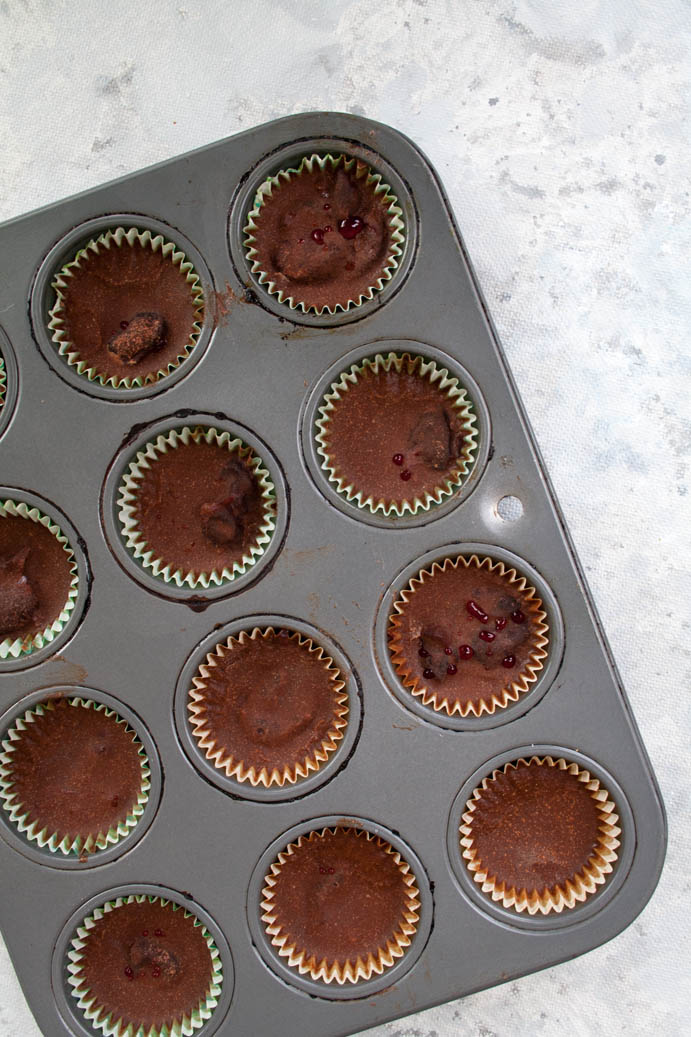 Chocolate Cherry Fat Bombs birds eye view in muffin pan.