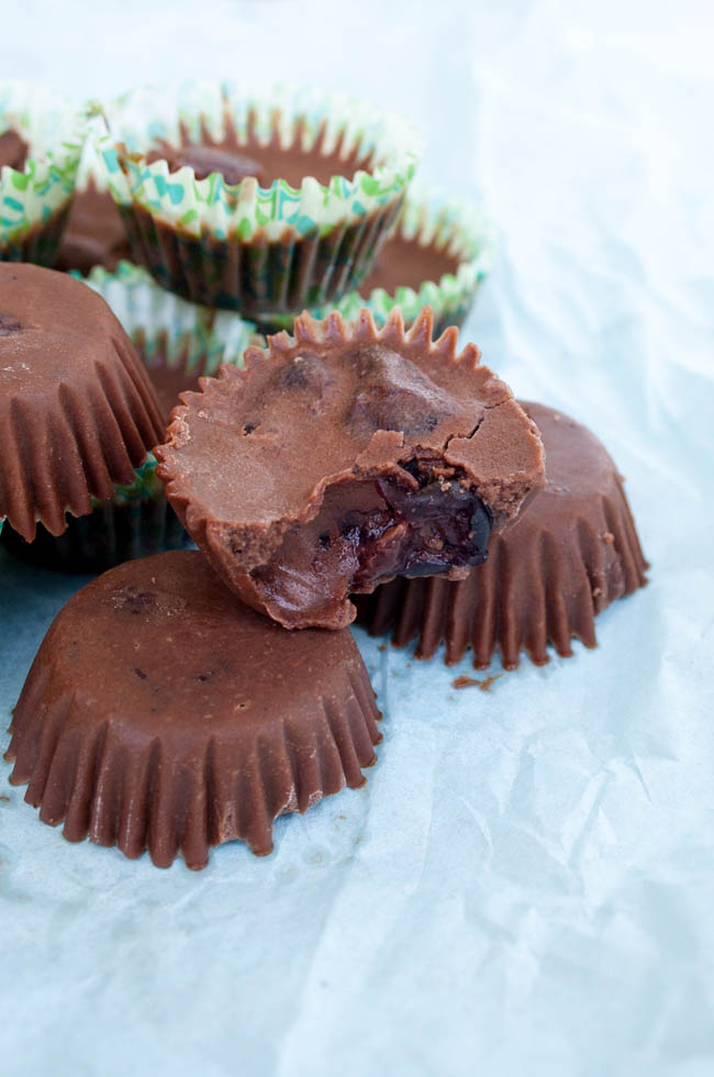 Chocolate Cherry Fat Bombs on light blue tissue paper.