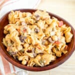 Red Lentil Pasta Salad with Chickpeas in a wood bowl.