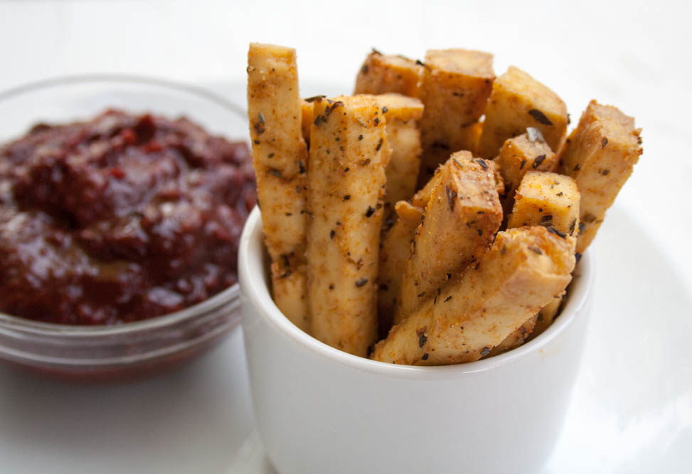 Baked Tofu Fries with raspberry chipotle ketchup in background.