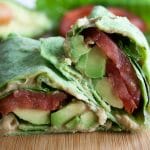 ALT (Avocado, Lettuce, and Tomato) Wrap on a cutting board.