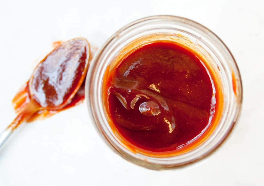 4 Ingredient Sriracha BBQ Sauce with spoon.