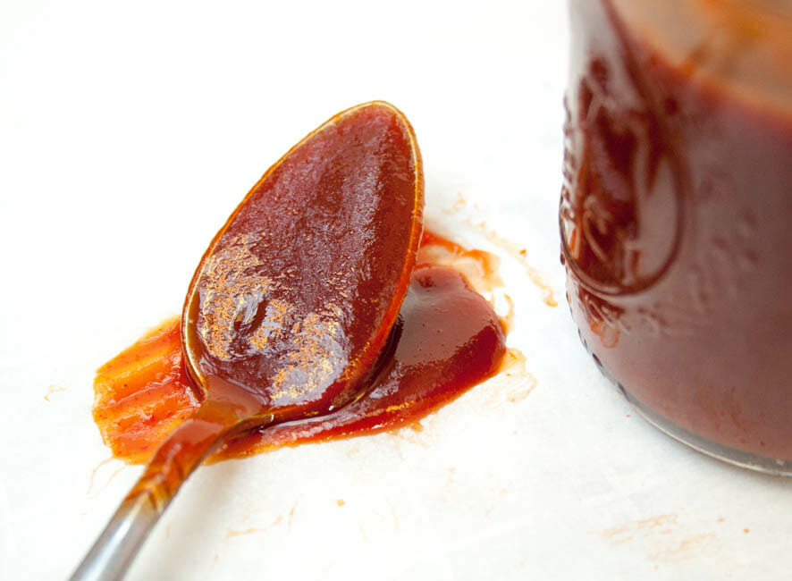 Close up of spoonful of 4 Ingredient Sriracha BBQ Sauce