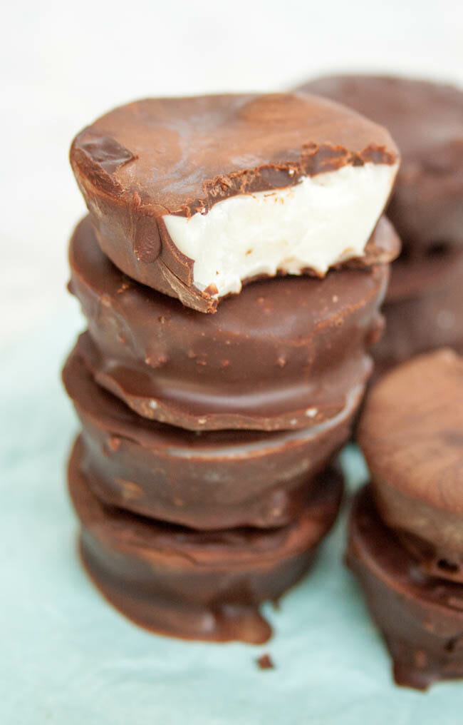Chocolate Peppermint Fat Bombs in stacked on top of each other.