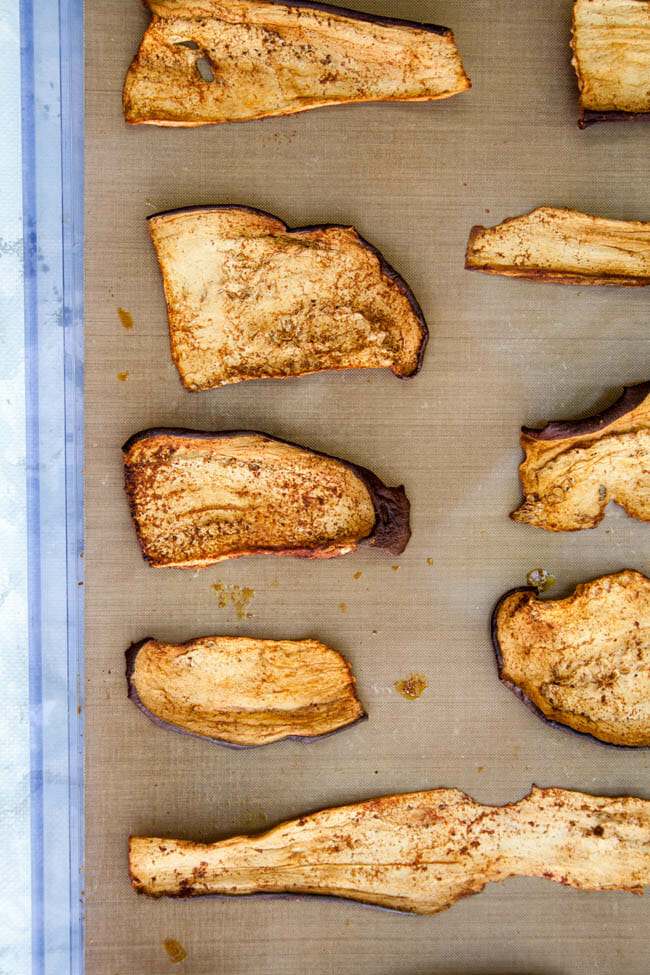 Dehydrated Eggplant Bacon on dehydrator sheet.