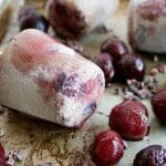 Chocolate Cherry Chia Pudding Popsicles on a tray.