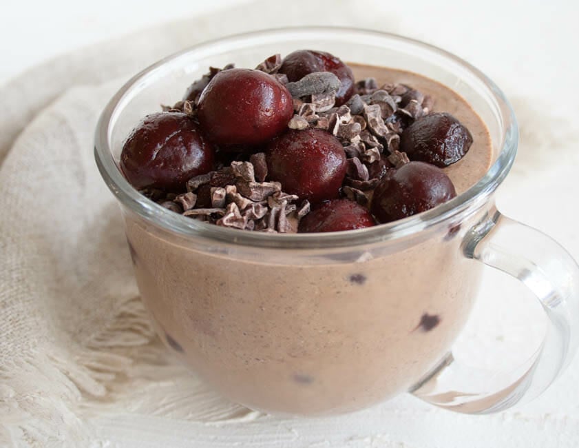 Chocolate Cherry Chia Pudding in a large mug.