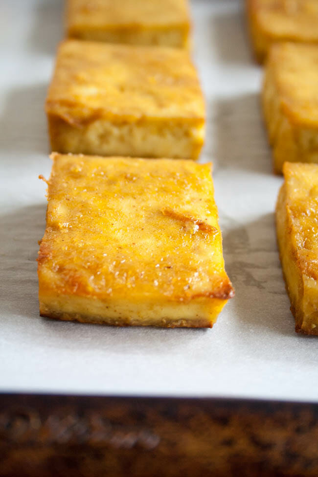 Maple Dijon Baked Tofu on parchment paper.