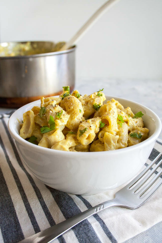 Tofu Mac and Cheese with fork and pan in background.