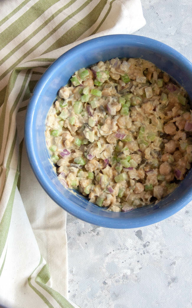 Chickpea salad in a bowl after mixing.