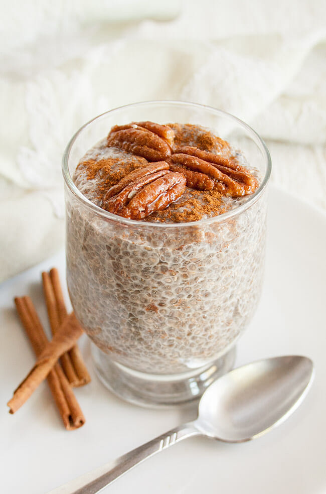 Vegan Nog Chia Pudding in jar with spoon.