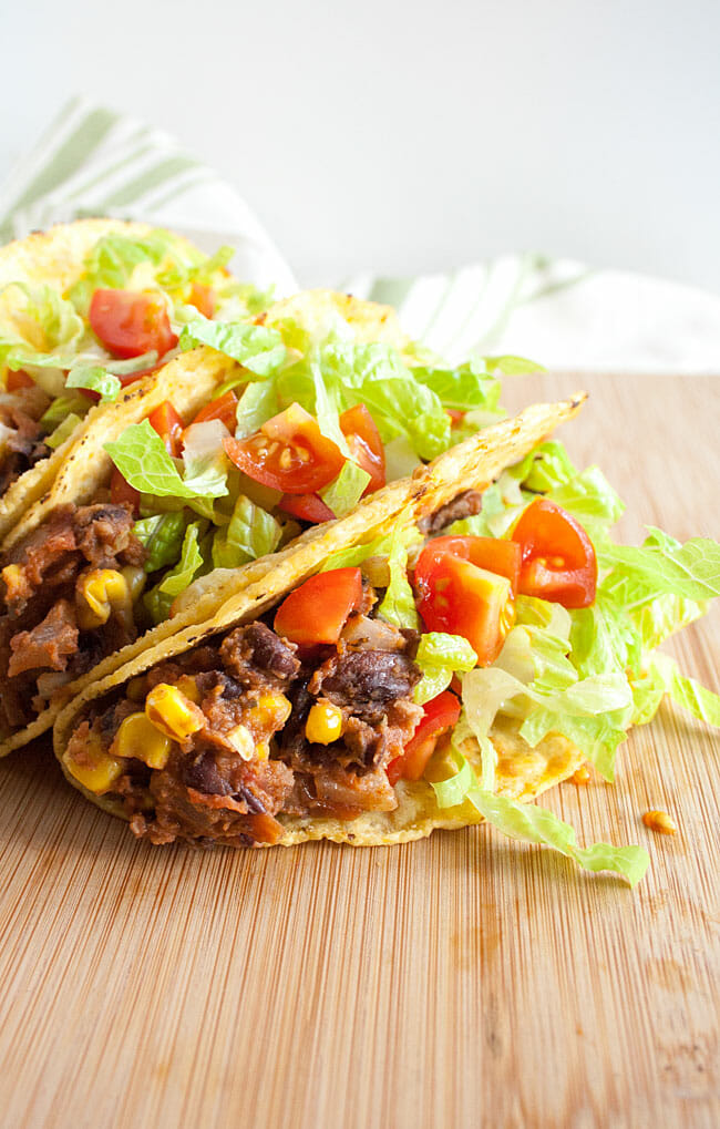 Black Bean and Corn Tacos on a cutting board.