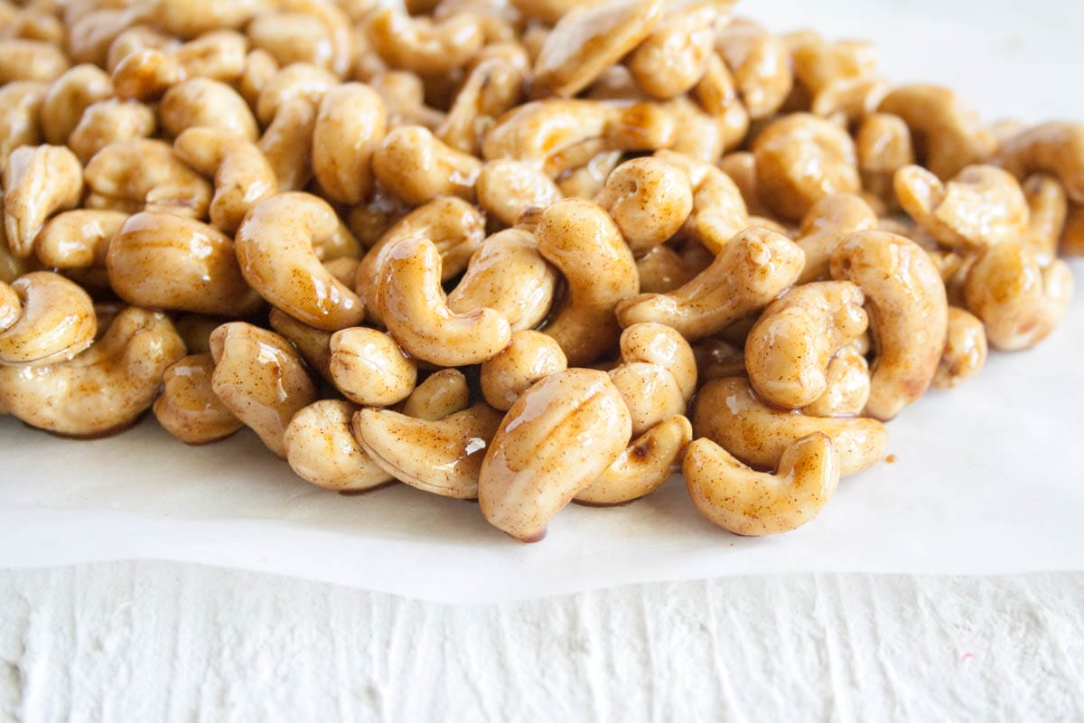 Candied Cashews on parchment paper.