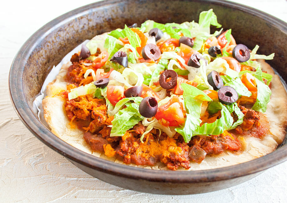 Vegan Taco Pizza in a. pan close up.