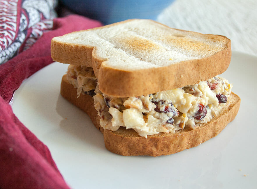 Apple Pecan Chickpea Salad Sandwich on a plate.