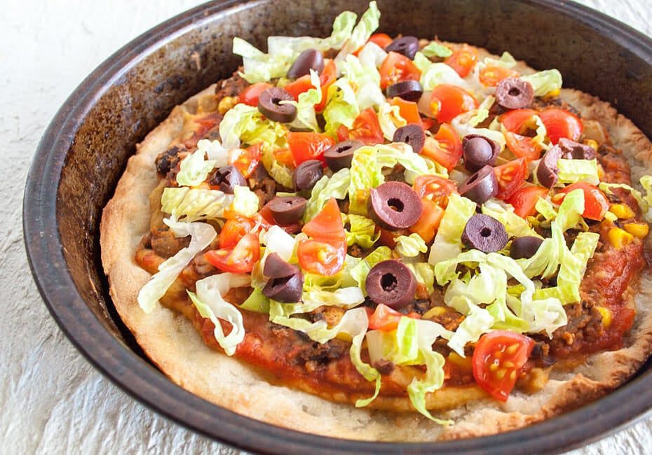 Black Bean and Corn Taco Pizza in pan.
