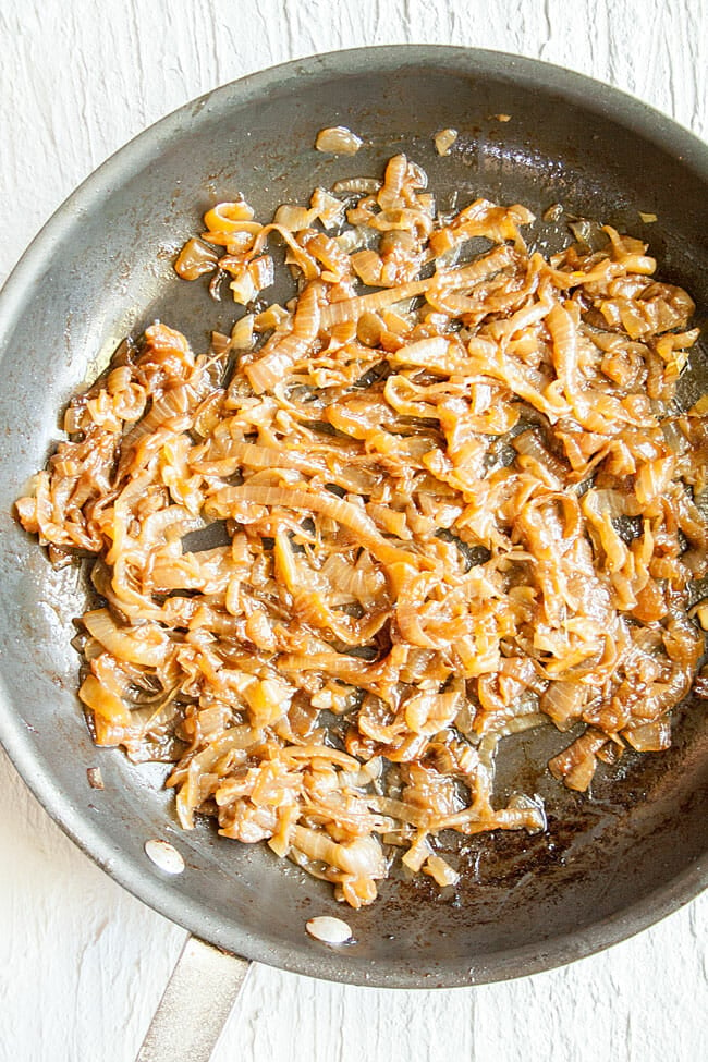 Caramelized onions in a pan after cooking.