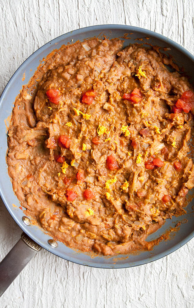 Refried beans in a pan.