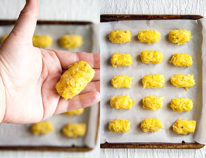 Cheesy Tater Tots being formed and placed on a parchment lined baking sheet.