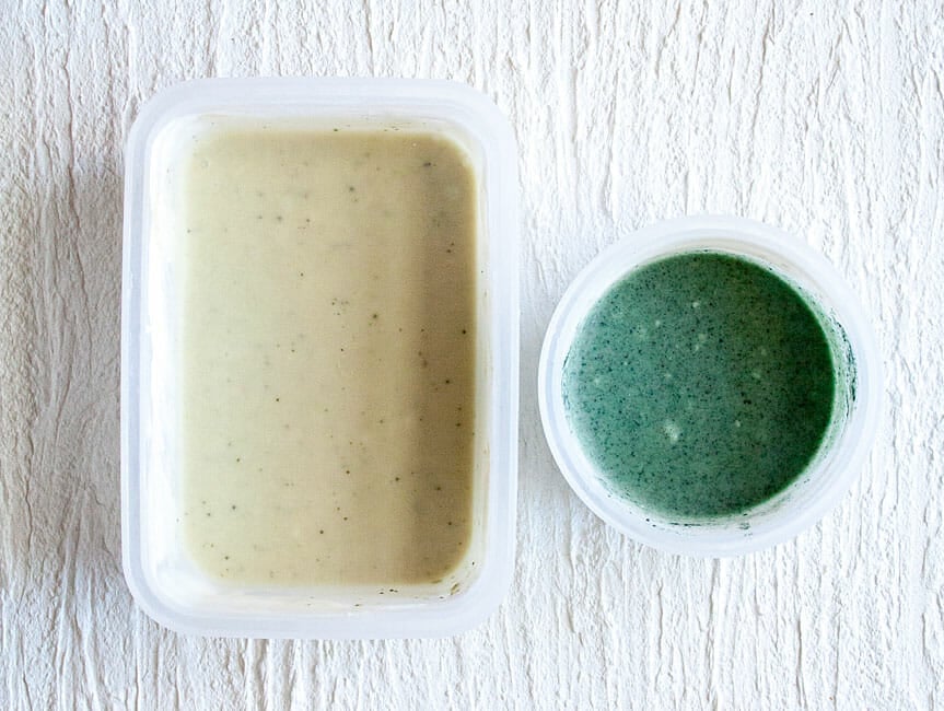 Two containers of vegan mint ice cream. The one on the left was made with match green tea and the one on the right was made with spirulina.
