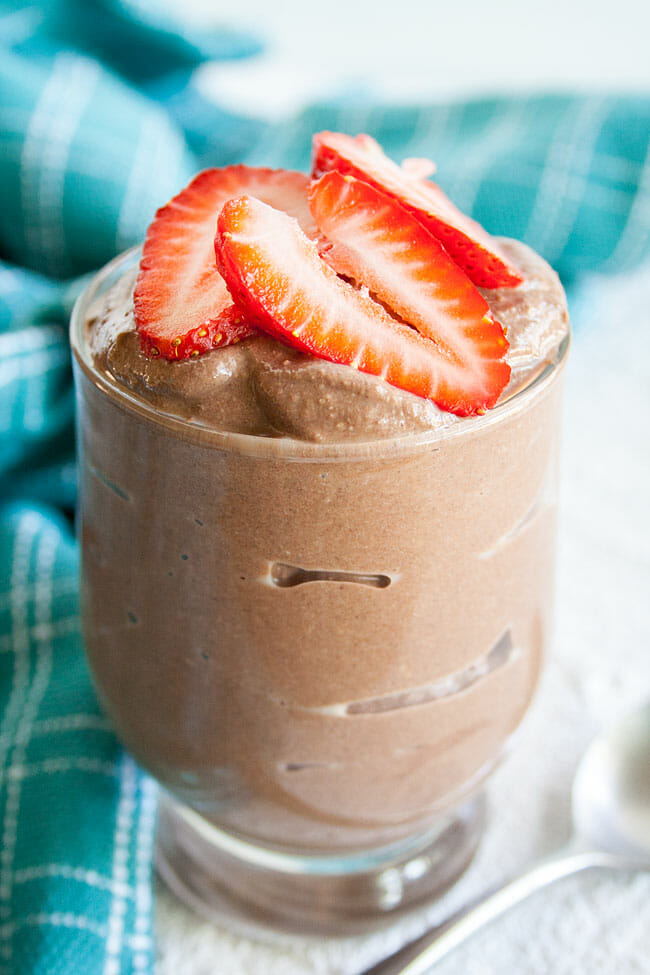 Chocolate Tofu Pudding with sliced strawberries on top. 