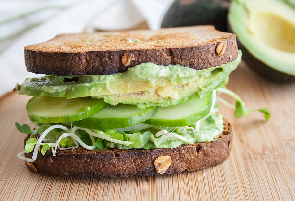 Sandwich on a cutting board.