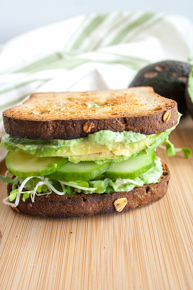 Green Goddess Sandwich on cutting board close up.