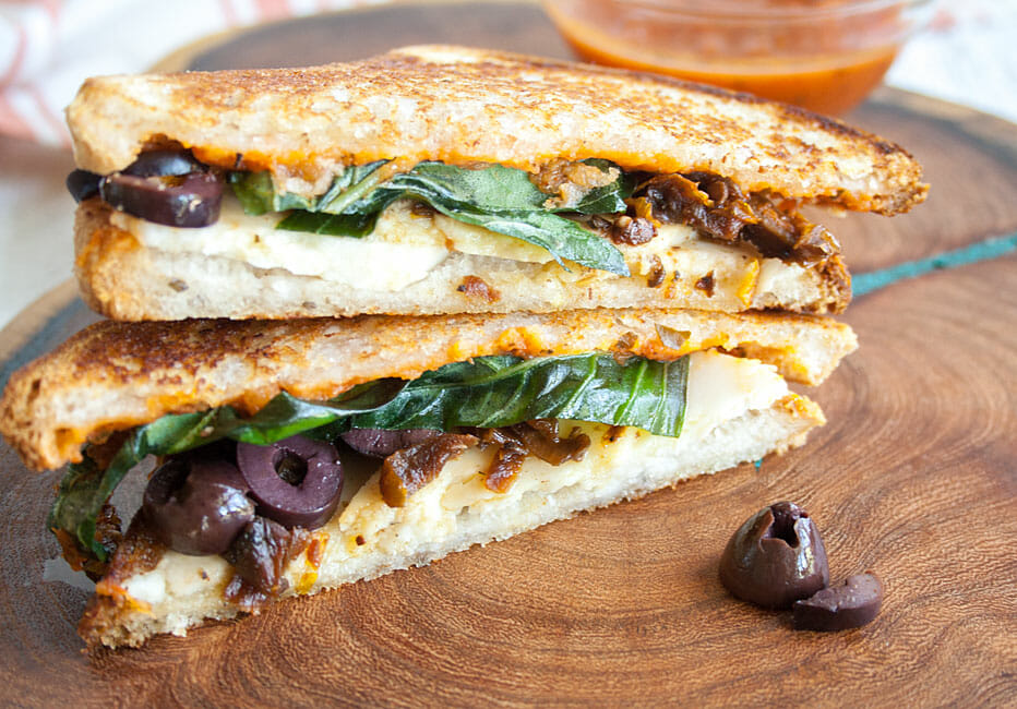 Pizza Grilled Cheese on cutting board.