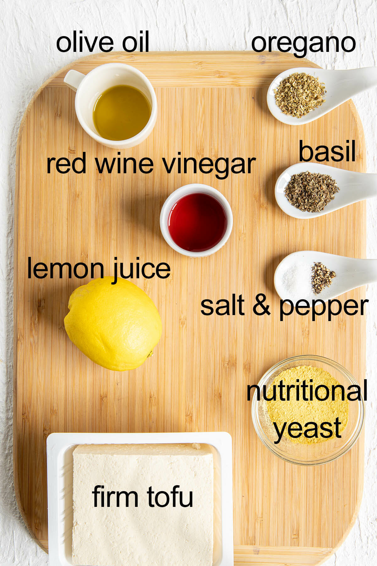 Ingredients on a cutting board with labels.