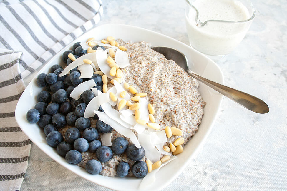 Hot Chia Seed Porridge in a bowl with spoon.