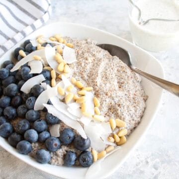 Spiced Chia Seed Porridge in a bowl with spoon.