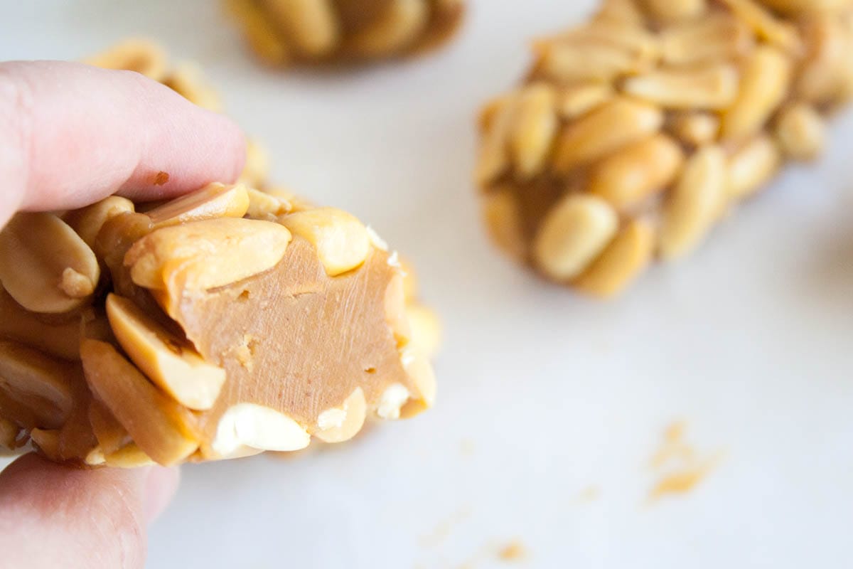 Homemade Payday Bar in  hand with more in the background.