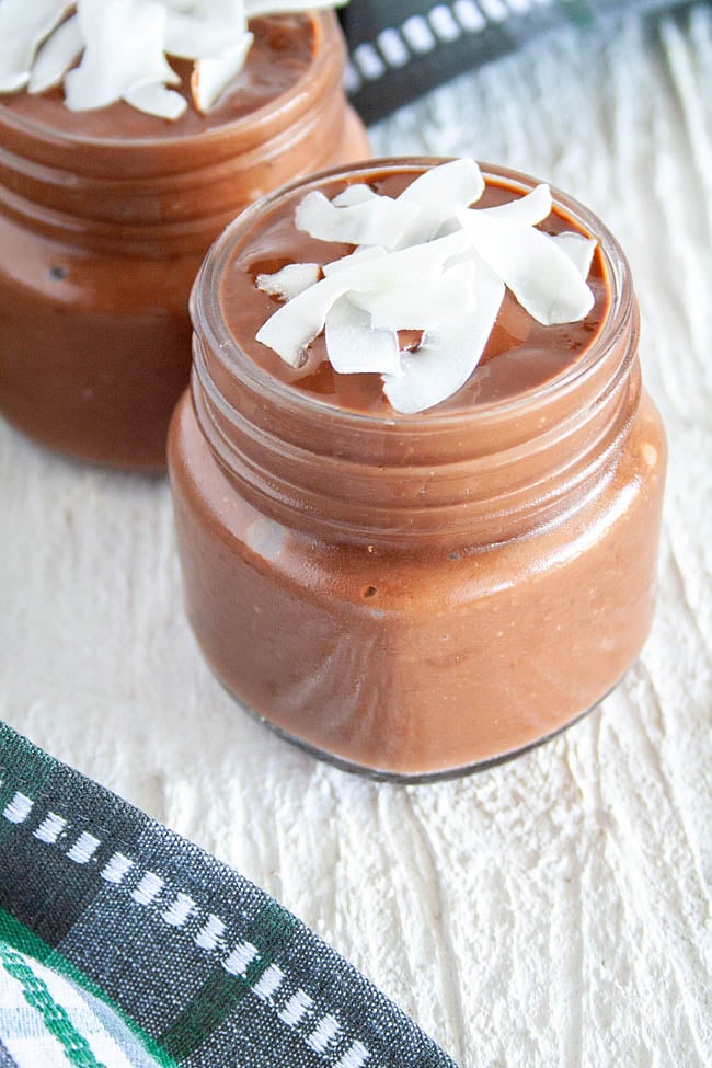 Vegan Chocolate Pudding in mason jars.