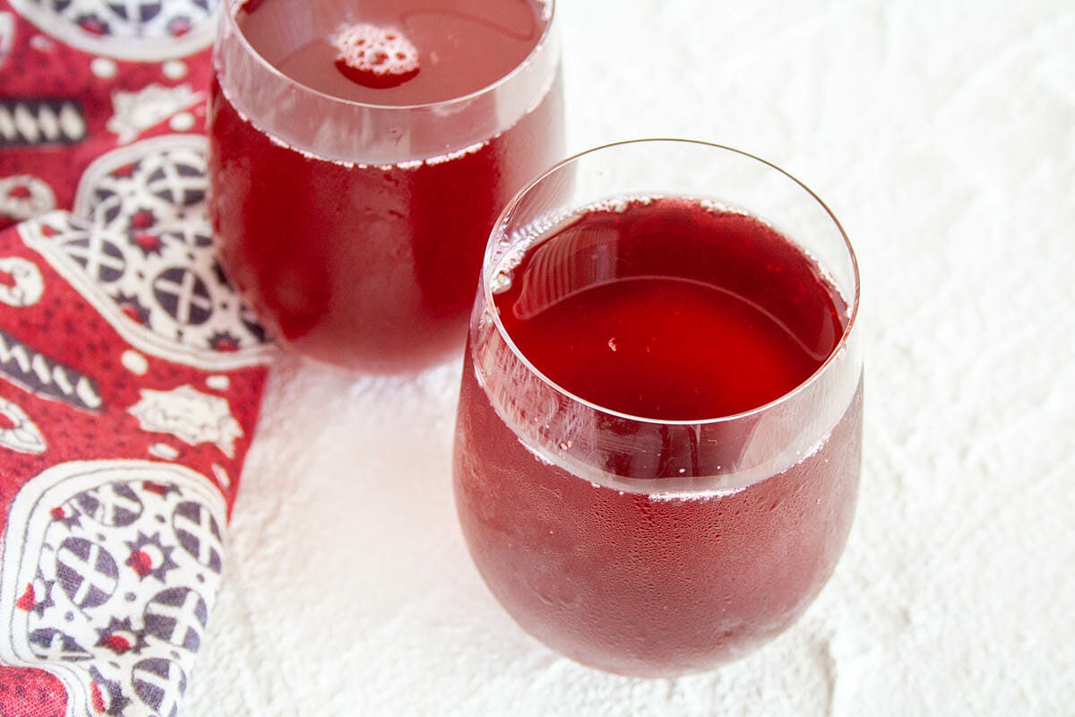 Cherry Kombucha in two glasses close up.