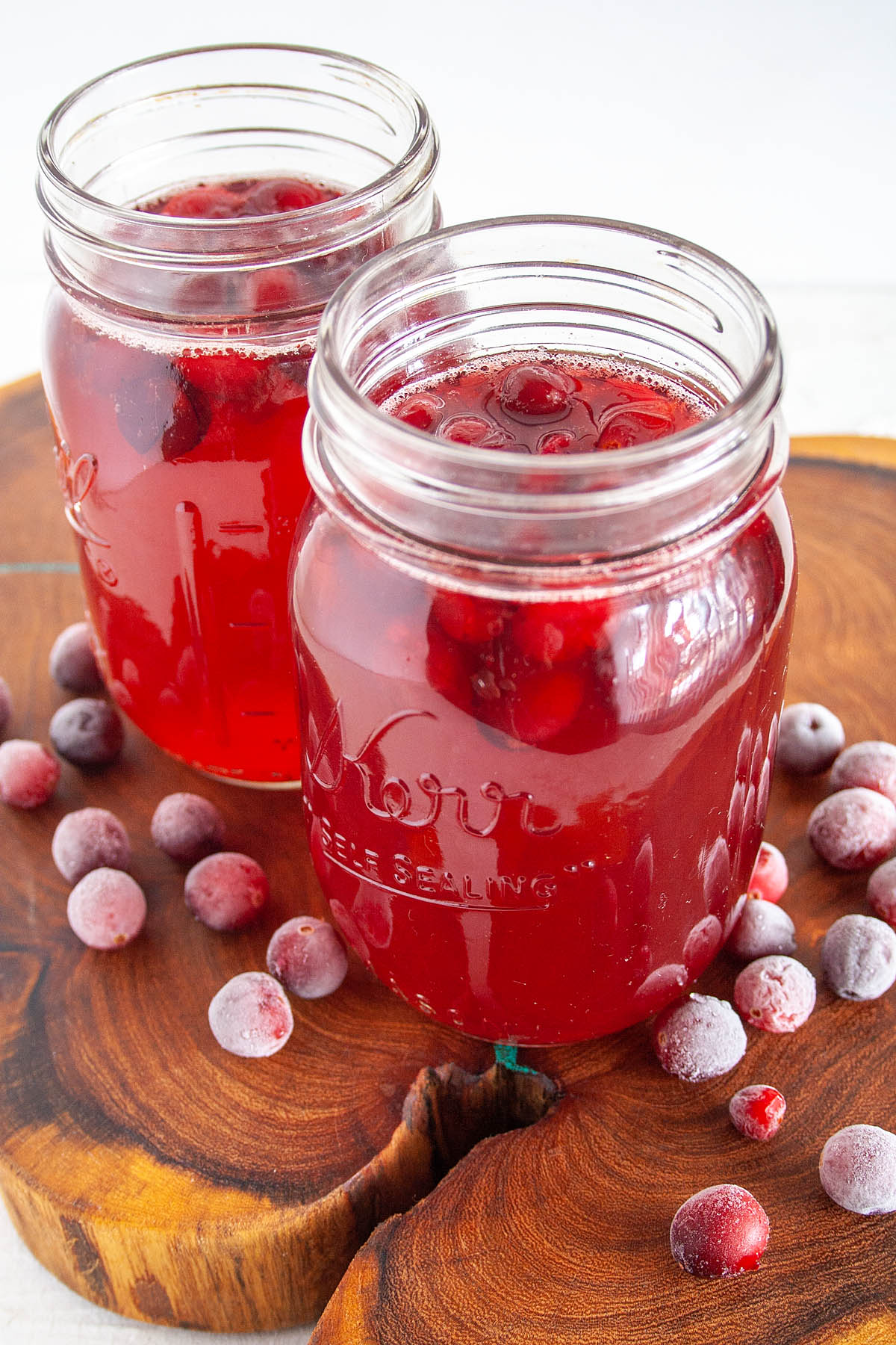Two mason jars of Cranberry Kombucha