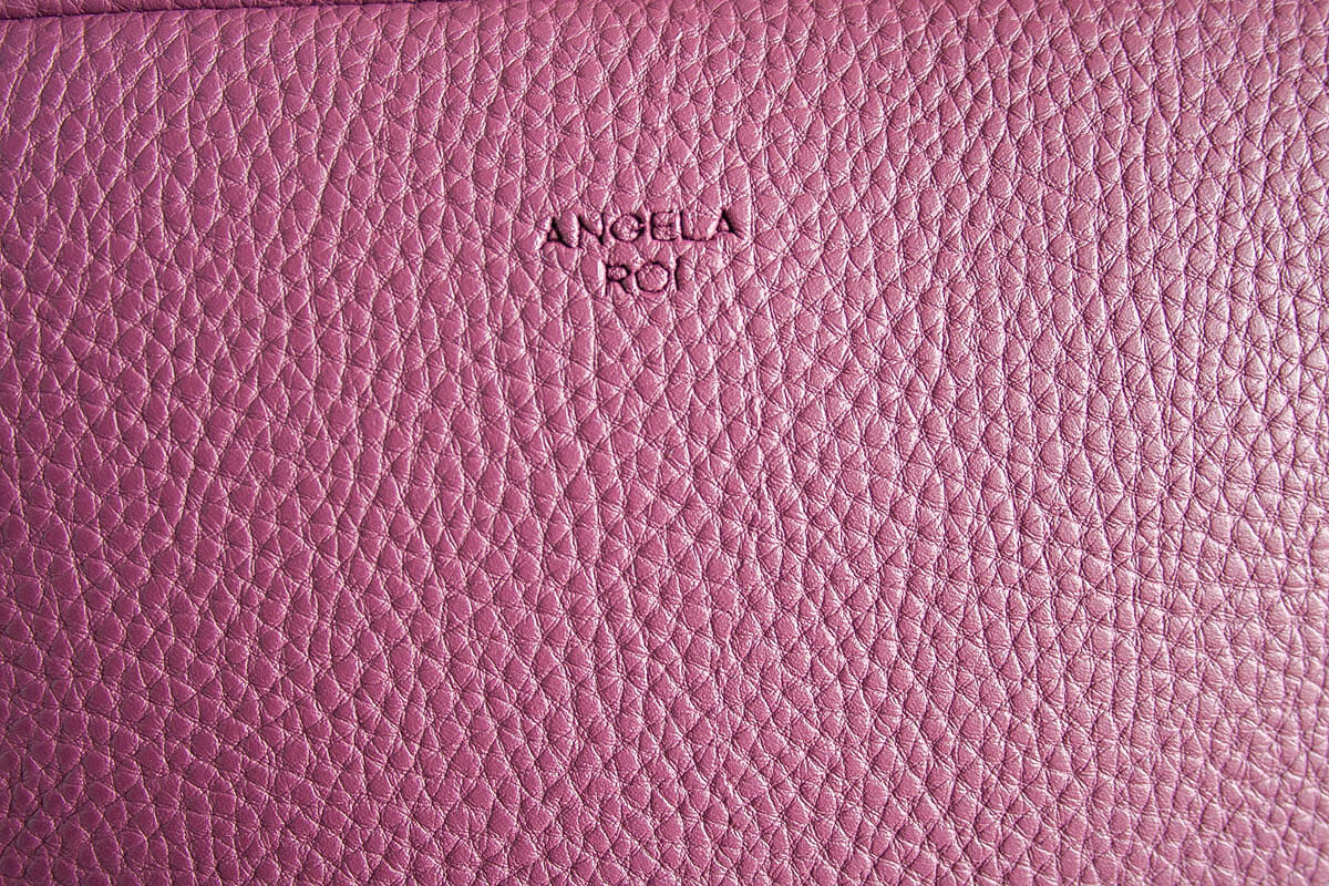 Grace Mini Crossbody in purple extreme close up to show texture.