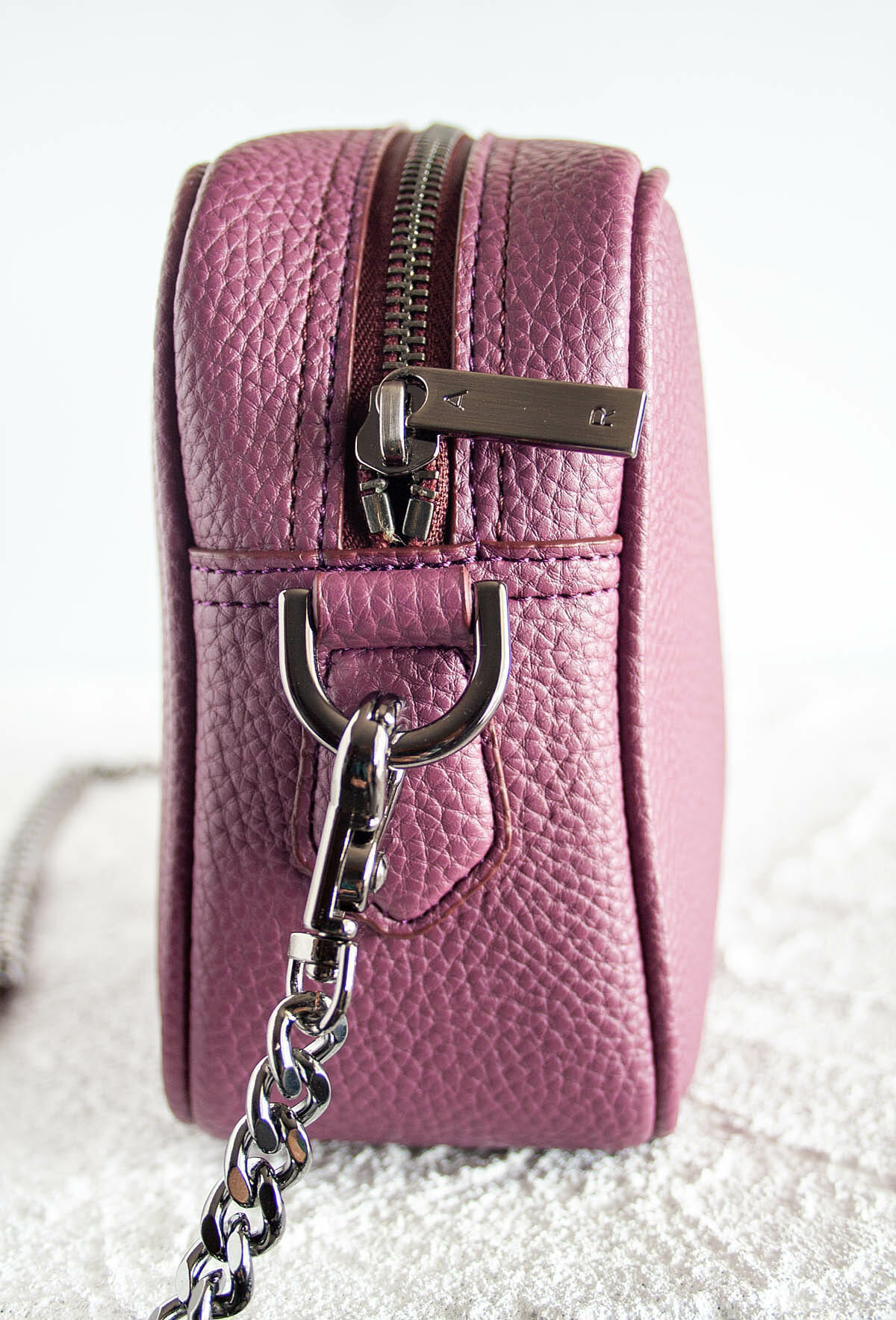 Grace Mini Crossbody side view with chain.