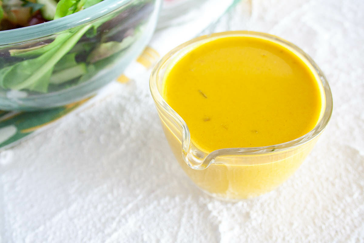 Turmeric Tahini Dressing in pitcher.