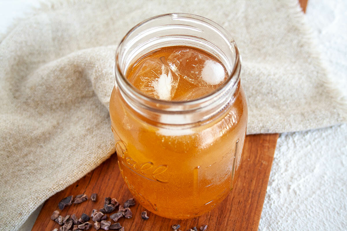 Cold Brew Cacao in mason jar with ice.