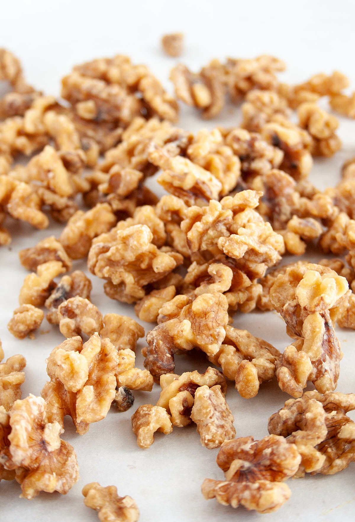 Maple Walnuts on parchment paper.
